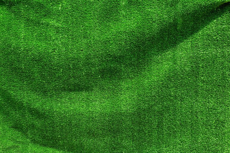 Close-up of artificial grass showing creases and folds for a flawless lawn.