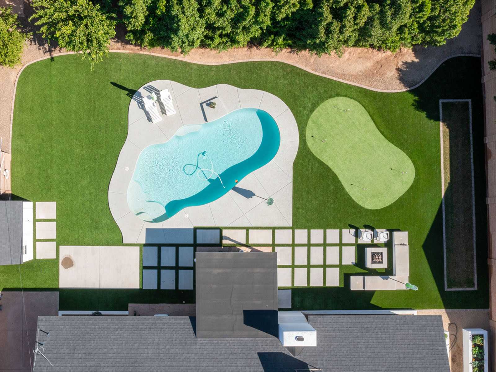 Aerial view of artificial turf and hardscaping installed in Apache Junction, AZ