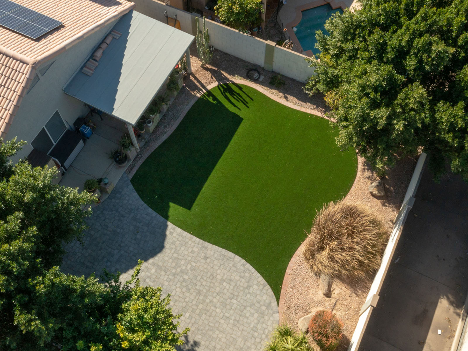 Aerial view of artificial turf and hardscaping installed in Rio Verde, AZ