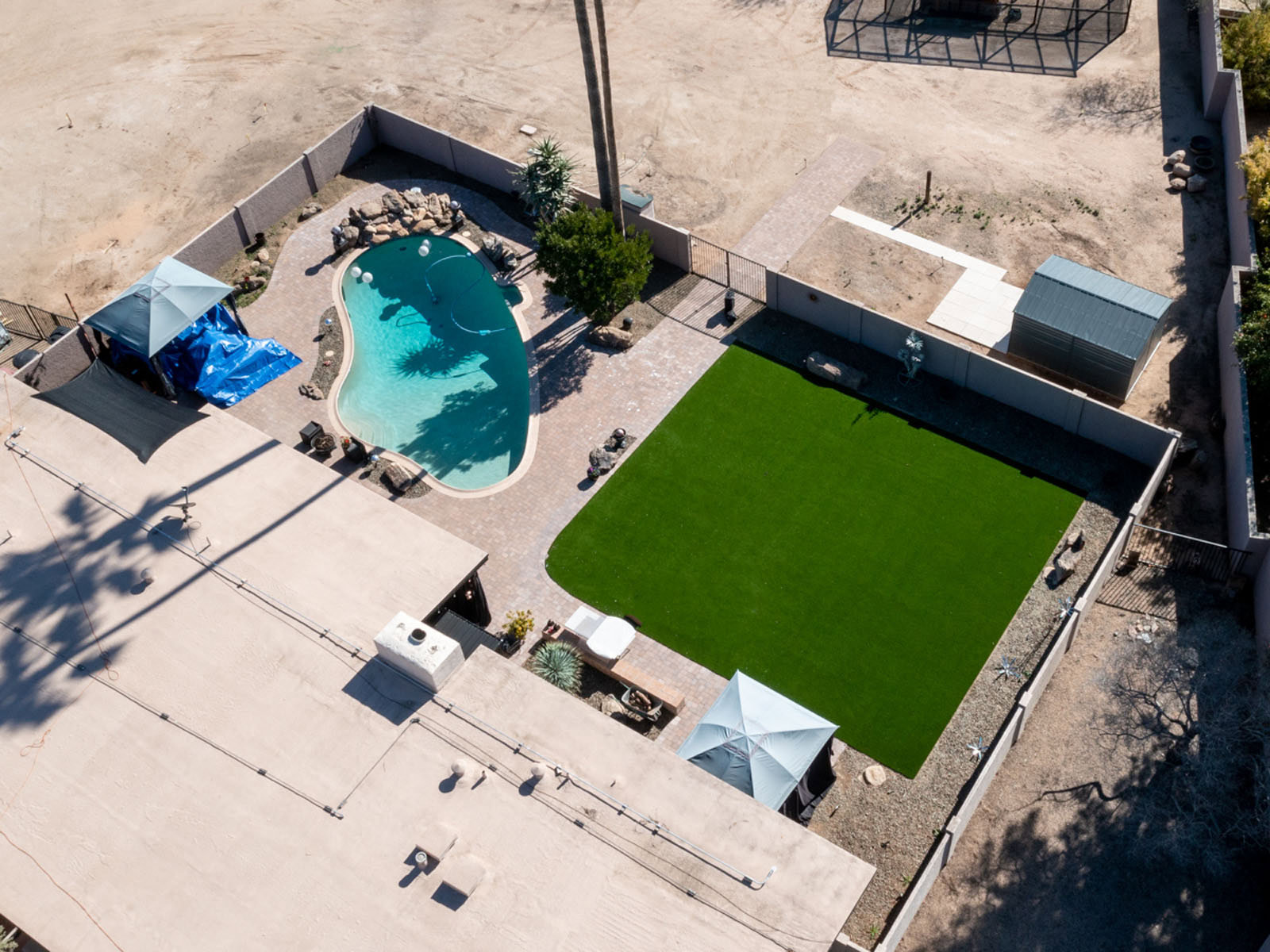 Aerial view of artificial turf and hardscaping installed in Cave Creek, AZ