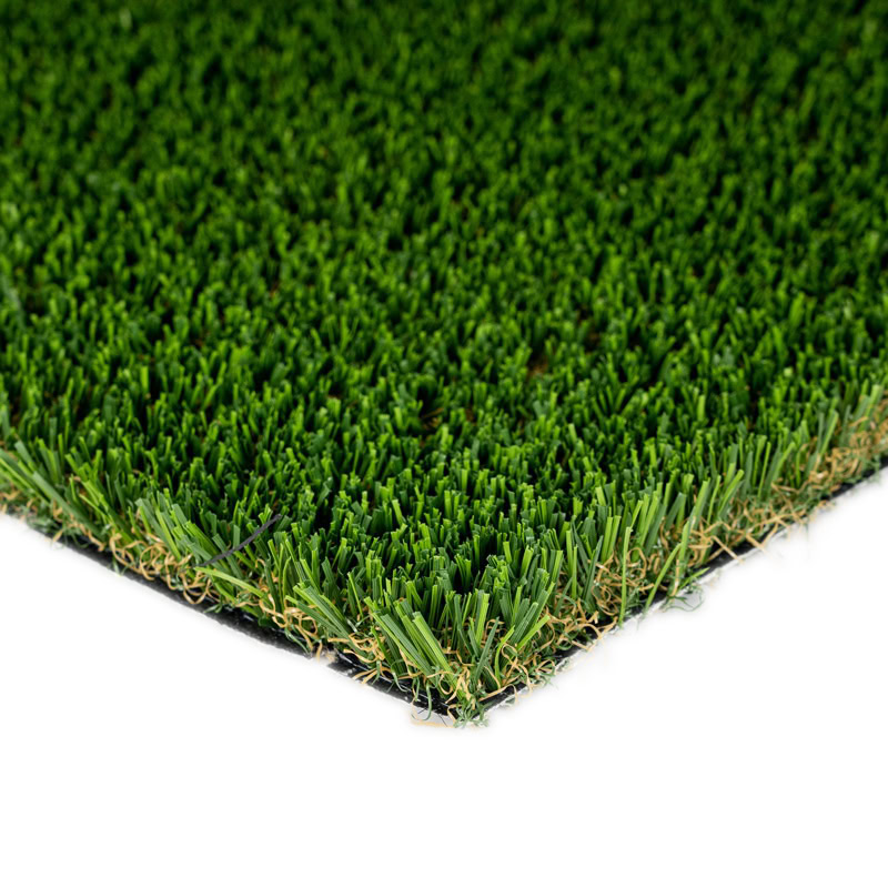 Close-up of lush green artificial turf for luxury lawns and putting greens.