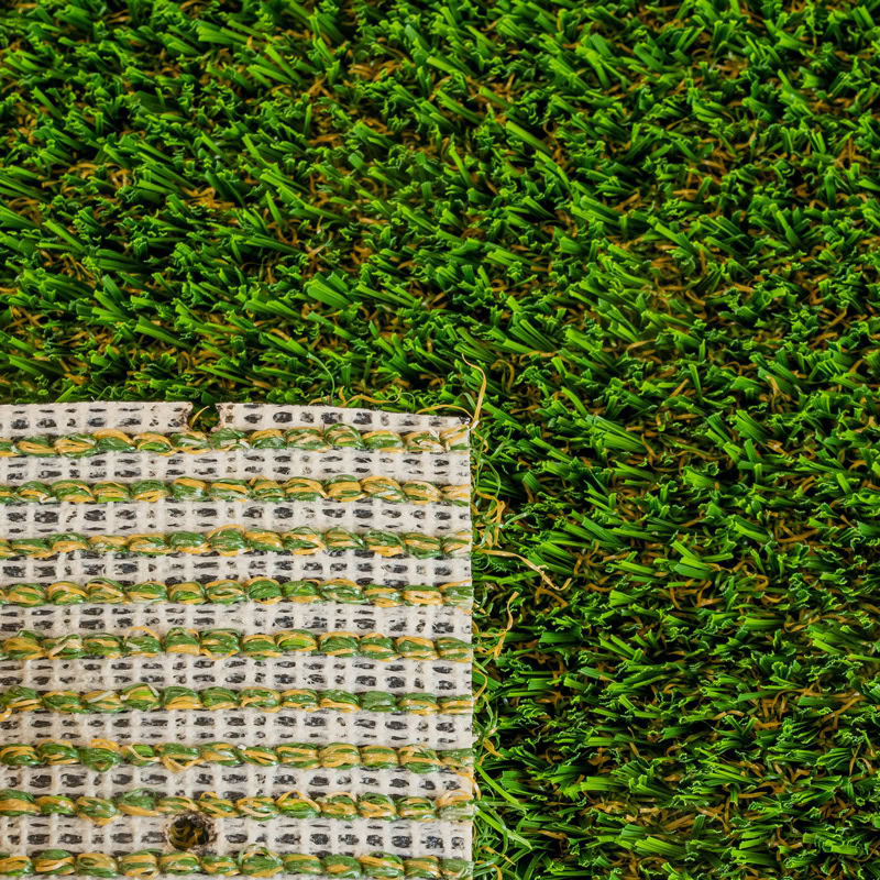 Close-up of artificial turf and putting green for luxury lawn design.