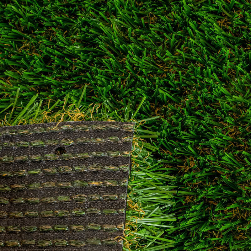 Close-up of lush green artificial grass for luxury lawns and putting greens.