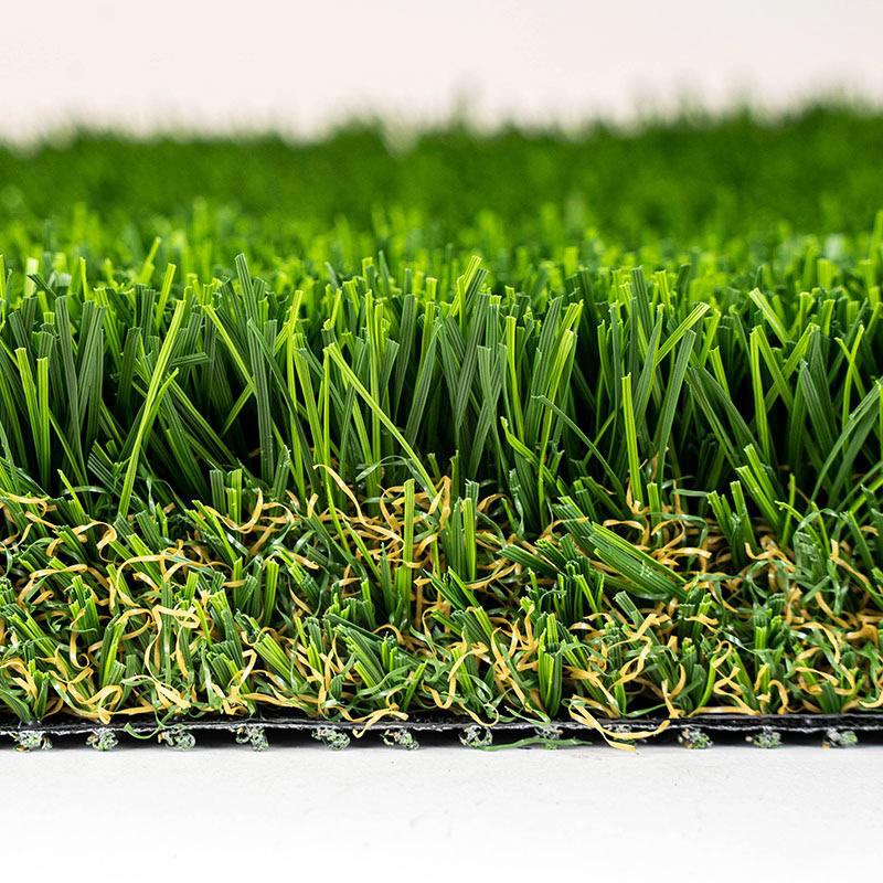 Close-up of lush green artificial turf for luxury lawns and putting greens.