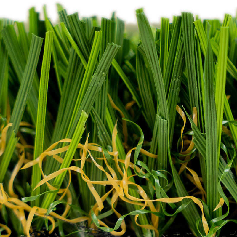 Close-up of lush green artificial grass for luxury lawns and putting greens.