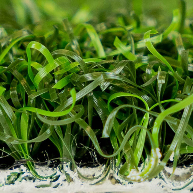 Close-up of lush green artificial grass for luxury lawns and putting greens.