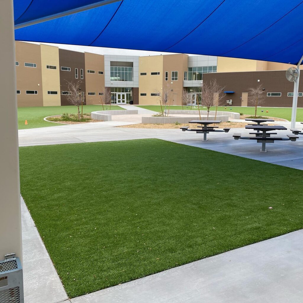 Beautiful artificial turf and outdoor seating area at Arizona Luxury Lawns.